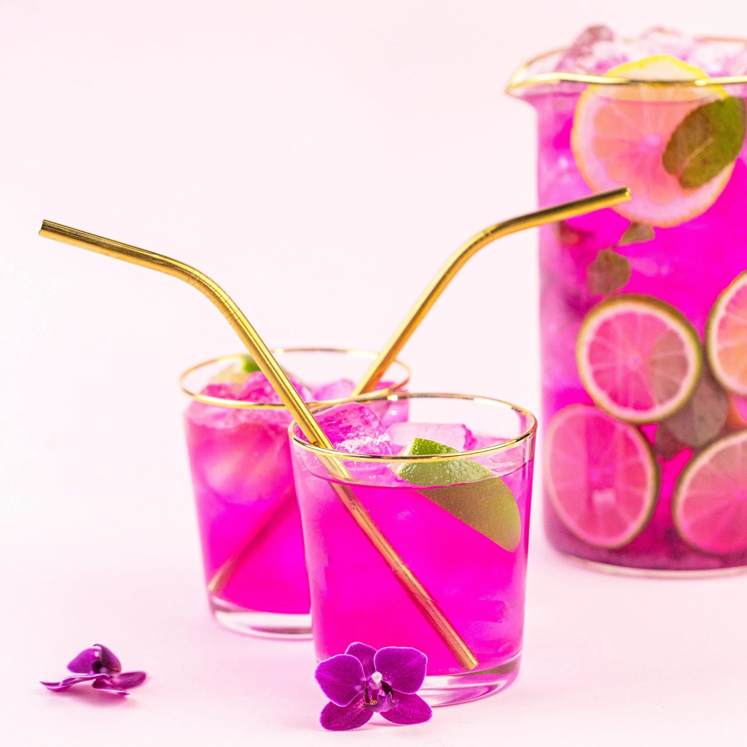Vibrant pink lemonade, possibly made with butterfly pea powder