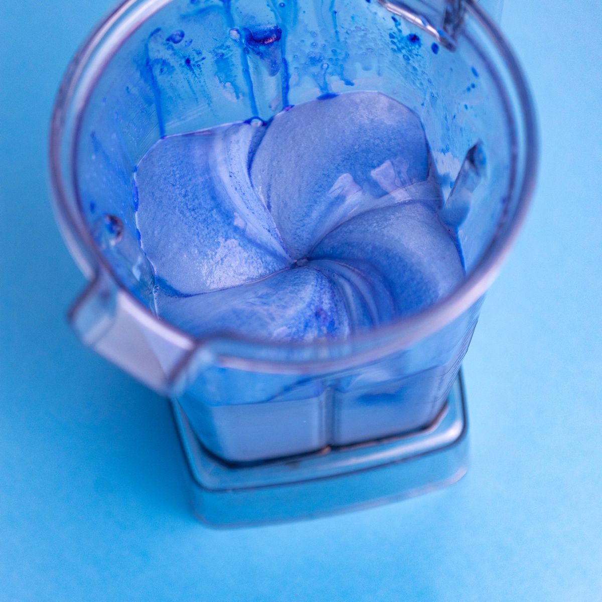 Thick, creamy smoothie bowl topped with fruit and granola