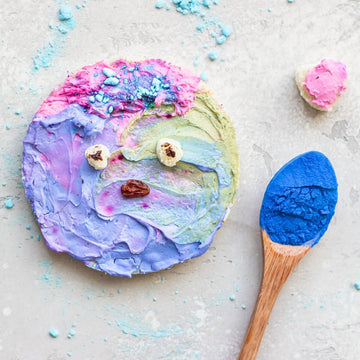 Colourful kids’ snacks made with natural superfood powders in pink, blue and purple shades