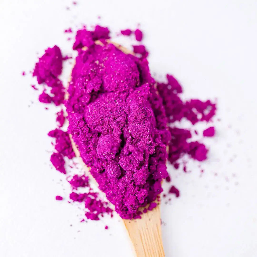Dragon fruit powder natural pink food coloring on spoon