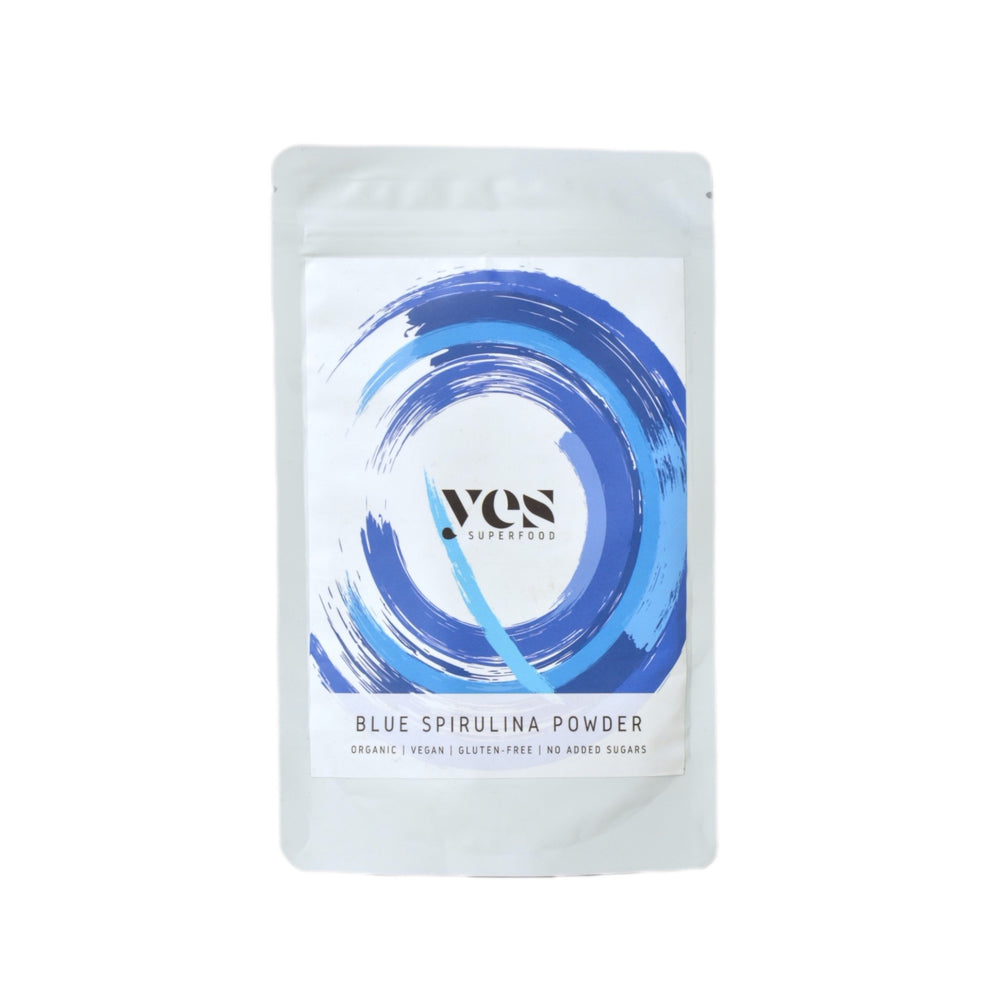Package of Yes Superfood Blue Spirulina Powder on a white background