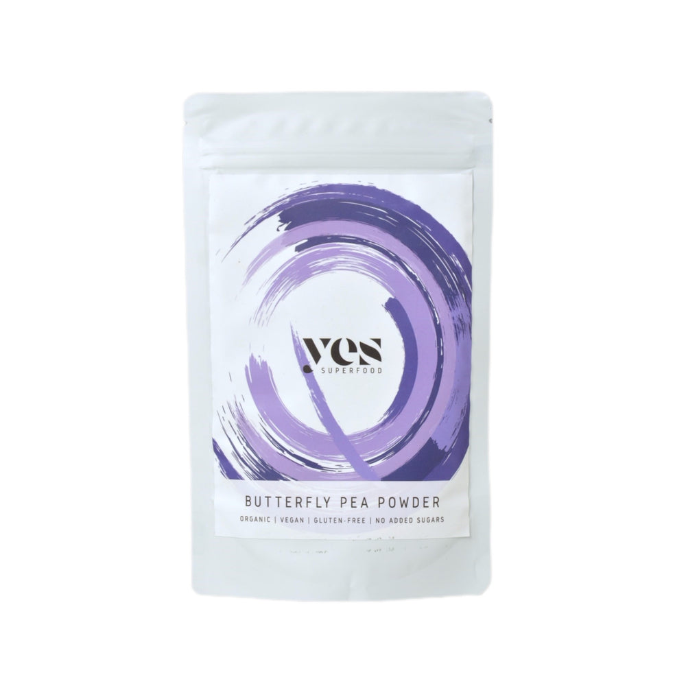 Yes Superfood Packaging of butterfly pea powder with a purple circular design on a white background