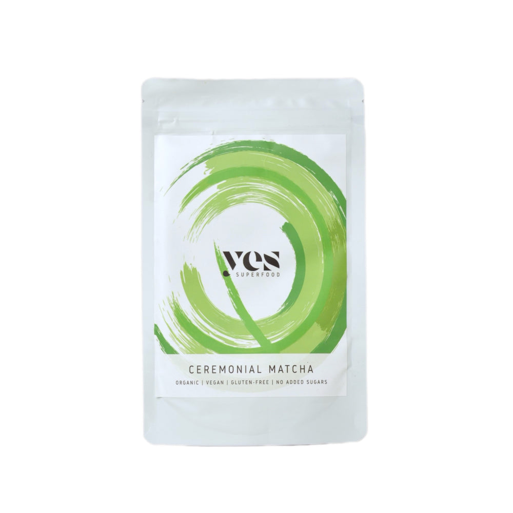 Yes Superfood Ceremonial matcha packaging with green circular design on a white background