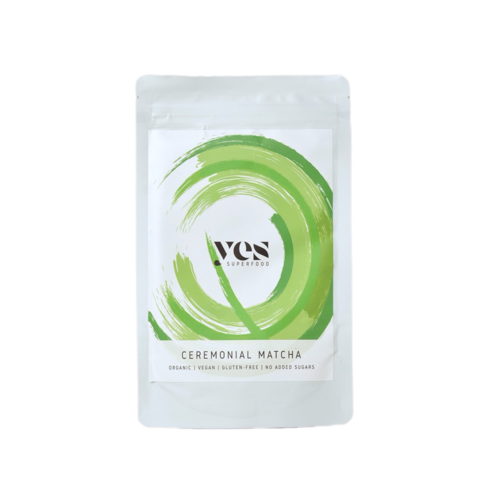 Yes Superfood Ceremonial matcha packaging with green circular design on a white background