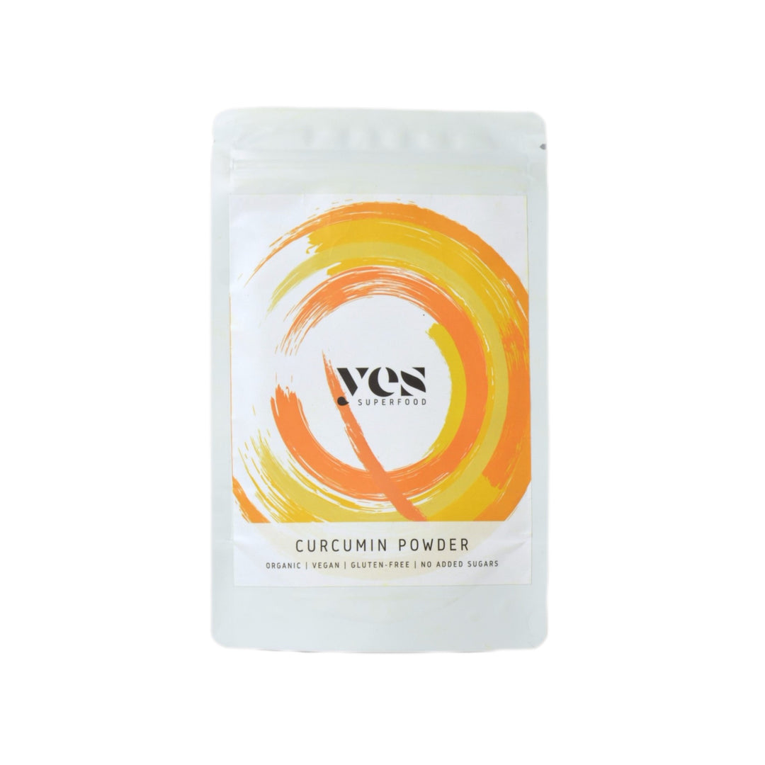 Yes Superfood yellow Curcumin Powder packaging with yellow design on a white background