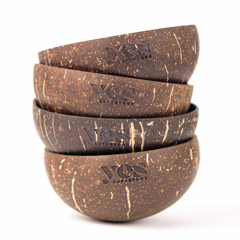 Set of four coconut bowls with 'WOS' branding on a white background