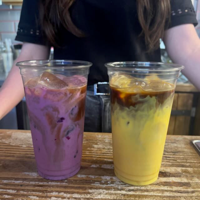 Curcumin Powder iced latte with coffee, showing natural yellow color in a café-style drink.