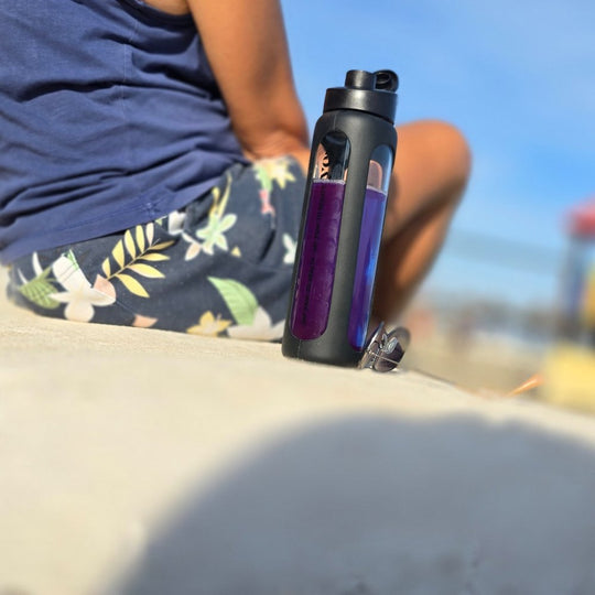Yes Superfood shaker with a purple superfood drink outdoors